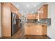 Well-equipped kitchen with stainless steel appliances, granite countertops, and seamless transition to other living spaces at 2024 Stanchion St, Haw River, NC 27258