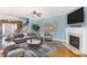 Comfortable living room with a fireplace, neutral colors, and stylish furnishings at 2024 Stanchion St, Haw River, NC 27258