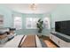 Bright main bedroom with light walls, a bay window, and contemporary furnishings at 2024 Stanchion St, Haw River, NC 27258