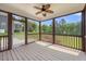 A spacious screened-in porch perfect for outdoor seating and relaxation at 2024 Stanchion St, Haw River, NC 27258