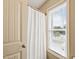 Simple bathroom with shower and window at 454 Big Willow Way, Rolesville, NC 27571