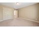 Spacious bedroom with double doors leading to the closet at 454 Big Willow Way, Rolesville, NC 27571
