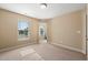 Bright bedroom with window and access to another room at 454 Big Willow Way, Rolesville, NC 27571