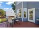 Enjoy this deck with seating and a view of the yard at 454 Big Willow Way, Rolesville, NC 27571