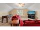 Relaxing game room with foosball table and comfy seating at 454 Big Willow Way, Rolesville, NC 27571