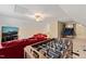 Entertaining game room with foosball and seating at 454 Big Willow Way, Rolesville, NC 27571