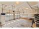 Spacious garage with overhead storage and double doors at 454 Big Willow Way, Rolesville, NC 27571