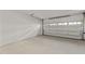 Spacious two-car garage with automatic door and ample room for storage and parking at 811 Maple Berry Ln # 101, Raleigh, NC 27607
