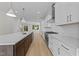 Modern kitchen with an island and breakfast bar, stainless steel appliances, and plenty of counter space at 811 Maple Berry Ln # 101, Raleigh, NC 27607
