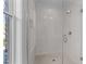 Walk-in shower with a glass door and white subway tile at 811 Maple Berry Ln # 101, Raleigh, NC 27607