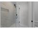 Bathroom featuring a glass-enclosed shower with white marble tile at 811 Maple Berry Ln # 102, Raleigh, NC 27607