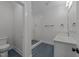 Bathroom featuring a glass-enclosed shower, a toilet, and a single vanity at 811 Maple Berry Ln # 102, Raleigh, NC 27607