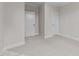 Neutral bedroom features fresh neutral paint, neutral carpet, and large closets for storage at 811 Maple Berry Ln # 102, Raleigh, NC 27607