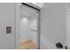 Modern home elevator with light wood floors and bright white walls, providing convenient accessibility at 811 Maple Berry Ln # 102, Raleigh, NC 27607