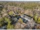 An aerial view of a contemporary home, showcasing its community, well-manicured landscape, and architectural design at 811 Maple Berry Ln # 103, Raleigh, NC 27607