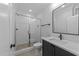 Modern bathroom with a glass-enclosed shower, sleek vanity, and contemporary fixtures at 811 Maple Berry Ln # 103, Raleigh, NC 27607