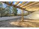 Private deck with a wood pergola offering an outdoor space perfect for relaxation and entertainment at 811 Maple Berry Ln # 103, Raleigh, NC 27607