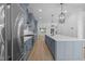 Open kitchen featuring new stainless steel appliances and a large island at 811 Maple Berry Ln # 103, Raleigh, NC 27607