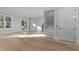 Bright and airy living room with hardwood floors and access to backyard at 811 Maple Berry Ln # 103, Raleigh, NC 27607