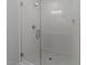 Bright shower with white subway tile, glass door, and recessed lighting at 811 Maple Berry Ln # 103, Raleigh, NC 27607