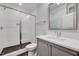 Bathroom features a glass-enclosed shower and a sleek vanity with modern fixtures at 811 Maple Berry Ln # 104, Raleigh, NC 27607