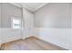 Cozy room with a window, chair rail, and neutral paint; perfect as an office or bedroom at 811 Maple Berry Ln # 104, Raleigh, NC 27607