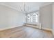 Large dining room features hardwood floors, modern lighting, and built in cabinets at 811 Maple Berry Ln # 104, Raleigh, NC 27607