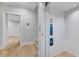 Hallway view with an elevator featuring call buttons and safety signage at 811 Maple Berry Ln # 104, Raleigh, NC 27607
