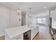 Island sink with stainless dishwasher are among the luxury kitchen appointments at 811 Maple Berry Ln # 104, Raleigh, NC 27607