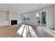 Cozy living room features built-in shelving, fireplace, and sliding doors to outdoors at 811 Maple Berry Ln # 104, Raleigh, NC 27607