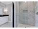 Bathroom with a glass enclosed marble shower at 811 Maple Berry Ln # 105, Raleigh, NC 27607