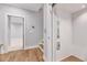 Hallway with a door and a residential elevator that offers convenient access to all levels at 811 Maple Berry Ln # 105, Raleigh, NC 27607