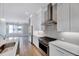 This kitchen combines modern appliances with a cozy breakfast nook, offering both functionality and a comfortable dining space at 811 Maple Berry Ln # 105, Raleigh, NC 27607