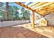Outdoor patio area with wood floor and wooden pergola at 811 Maple Berry Ln # 105, Raleigh, NC 27607