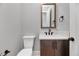 Modern half bathroom with stylish fixtures, vanity, and sleek design at 811 Maple Berry Ln # 106, Raleigh, NC 27607