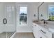 Bathroom with walk-in shower and granite countertop sink and drawers at 811 Maple Berry Ln # 106, Raleigh, NC 27607