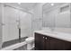 Elegant bathroom with walk-in shower, stylish vanity, and tile flooring at 811 Maple Berry Ln # 106, Raleigh, NC 27607