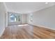 Bedroom with hardwood floors and windows offer abundant natural light at 811 Maple Berry Ln # 106, Raleigh, NC 27607