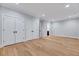 Spacious bedroom with hardwood floors, double closets, and neutral paint at 811 Maple Berry Ln # 106, Raleigh, NC 27607