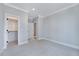 Empty bedroom featuring neutral walls, carpet, and ample closet space at 811 Maple Berry Ln # 106, Raleigh, NC 27607