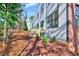 Modern building exterior with brick accents and large windows at 811 Maple Berry Ln # 106, Raleigh, NC 27607