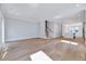 Spacious living room featuring hardwood floors, neutral walls, and ample natural light at 811 Maple Berry Ln # 106, Raleigh, NC 27607