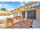Outdoor patio area with wood decking and a custom pergola at 811 Maple Berry Ln # 106, Raleigh, NC 27607
