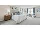 Luxurious main bedroom features a plush bed, elegant decor, and plenty of natural light at 8841 Tartan Clan Dr, Willow Springs, NC 27592