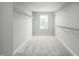 Spacious walk-in closet with ample shelving and storage, ready for organization at 8841 Tartan Clan Dr, Willow Springs, NC 27592