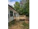 Exterior shot of a new wooden deck, perfect for outdoor entertaining or relaxing in a private setting at 2710 - A Mansfield Ave, Durham, NC 27703