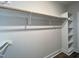 Walk-in closet featuring white shelving and built-in shelves for optimal storage space at 2710 - A Mansfield Ave, Durham, NC 27703