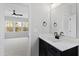Bright bathroom with large vanity and access to bedroom with lots of natural light at 55 Firefly Ln, Louisburg, NC 27549