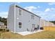 Back of house featuring a patio with backyard, great for entertaining at 628 Dorado Rd, Wendell, NC 27591