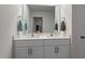Bathroom featuring double sinks with white cabinets and countertops at 628 Dorado Rd, Wendell, NC 27591